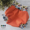 Couvre-couche DADO - Taille SMALL (BANDES À MOTIF)