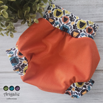 Couvre-couche DADO - Taille SMALL (BANDES À MOTIF)